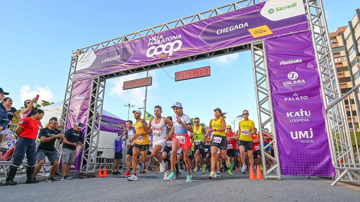 Corridas em Alagoas: imagens de corredores na Meia Maratona de Maceió.